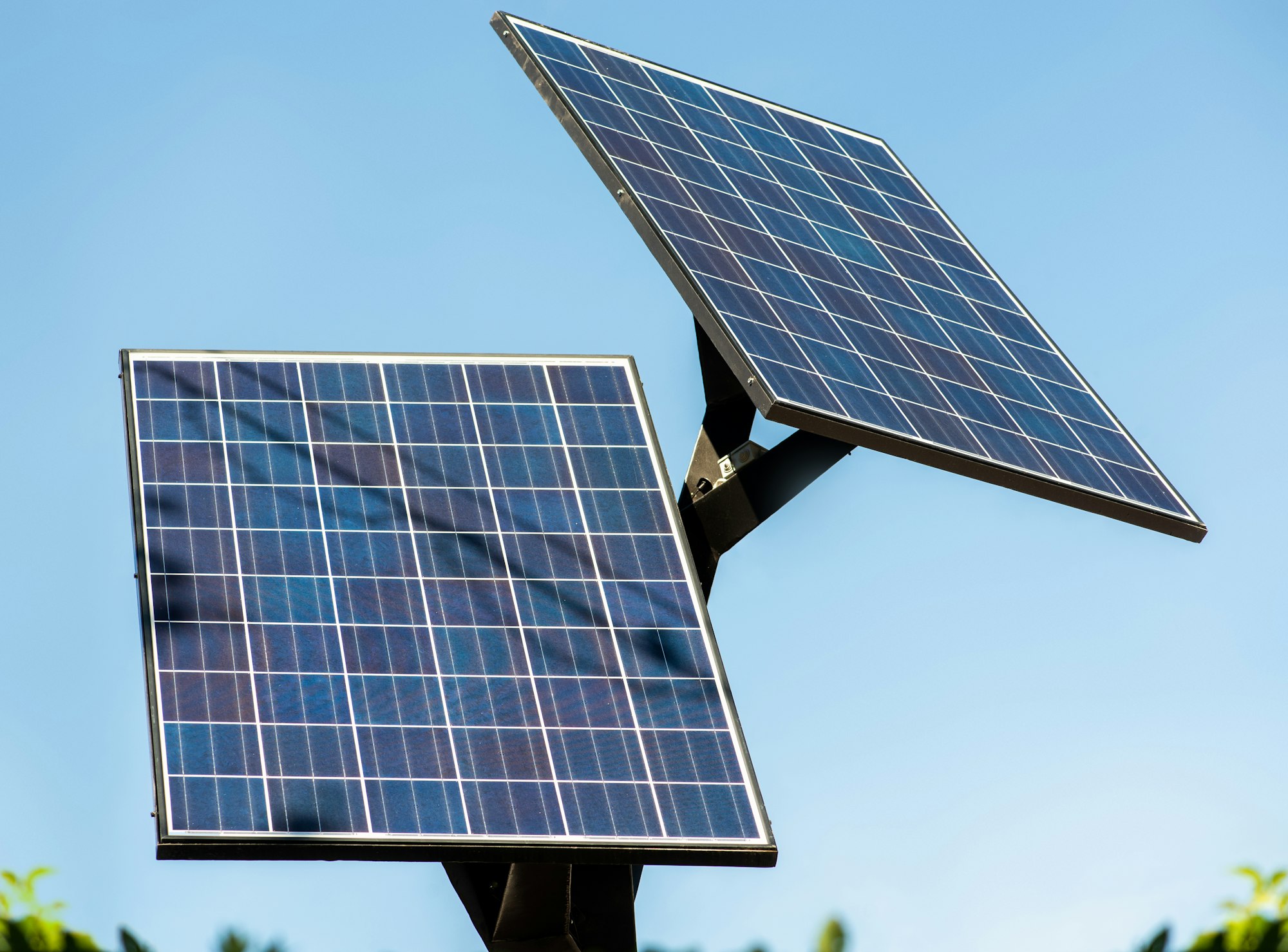 Renewable energy of solar panels. Solar panels on a background of blue sky.